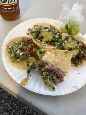 Two Carne Asada  tacos and two Suadero  tacos . By far some of the best tacos in Bakersfield! Very tasty and delicious.