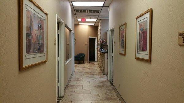 A view of the hallway to the patient rooms.