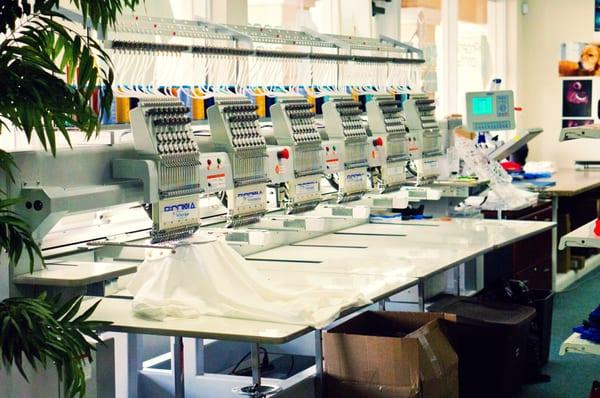 Our embroidery machine, it can do 6 shirts at once!