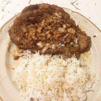 Bistec Encebollado made with thin sliced steak bought at this store very tasty and tender.