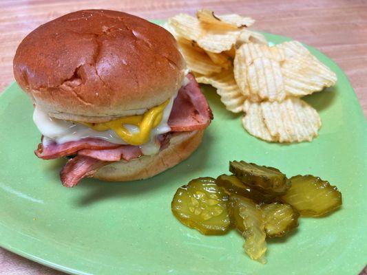 Backstage Cubano, pulled pork, ham, dill pickles, swiss cheese and mustard.