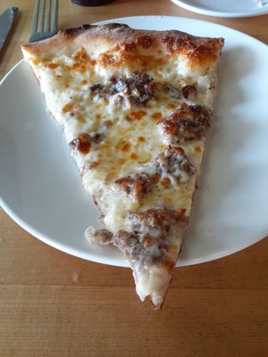 Slice Philly cheese steak pizza