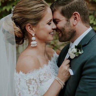 Bride and Groom Embrace after ceremony as Husband and Wife