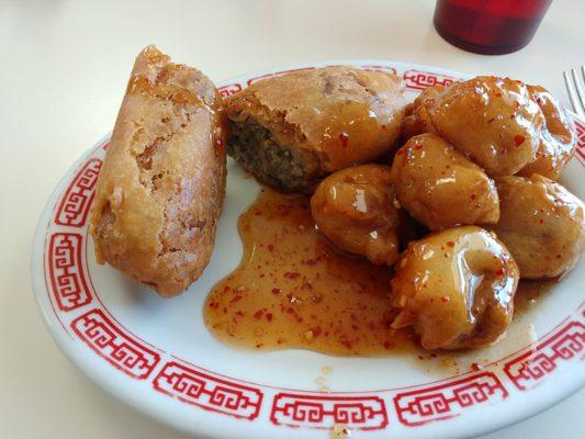 General Sour Chicken with an egg roll.