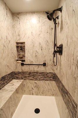 Corian shower with tile detail