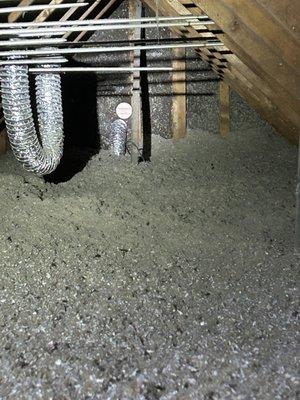 Improper dryer vent pipe in an attic that is not attached to the exterior cover.