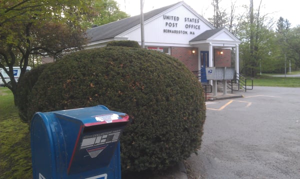 Drop box is located to the side of the parking lot.