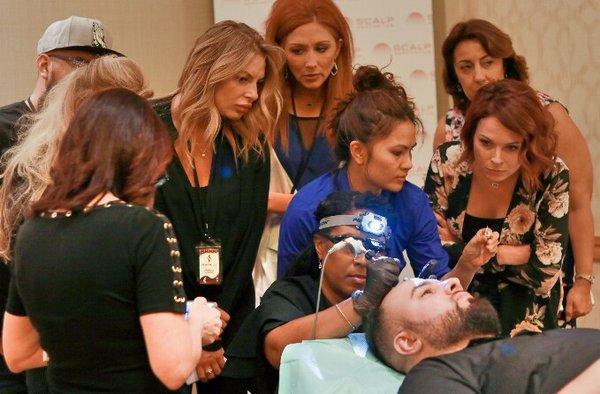 Training demo at a Scalp Micropigmentation conference. Contact us for training classes www.phaedrabeautysmp.com