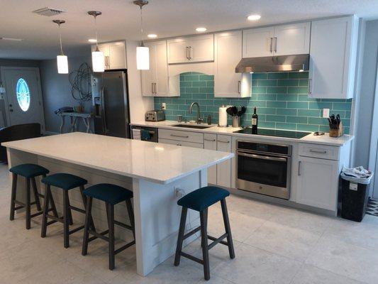 Purchased both floor and backsplash tile from Island Tile for my home. The kitchen renovation is now done and we are loving the results.