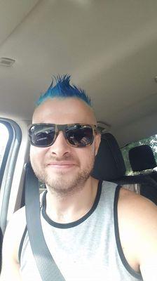 Magy color his hair in Magicuts Irving tx