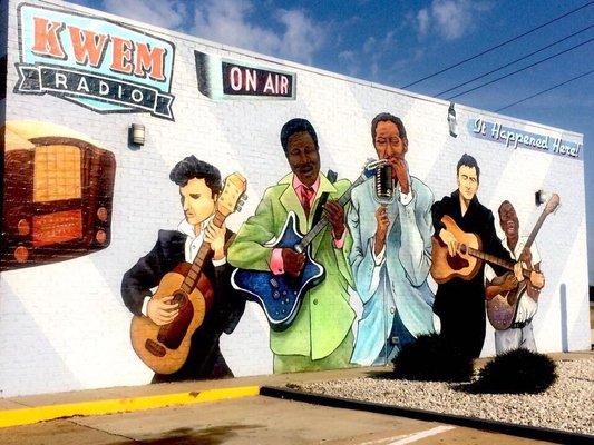 Mural on the side of the convenience store.