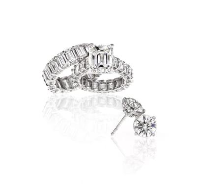 Custom made Platinum engagement ring and eternity band with custom made diamond stud earrings