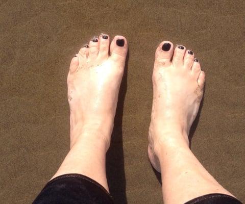 These are my toes in the Pacific Ocean after I had my mani pedi with Helena!