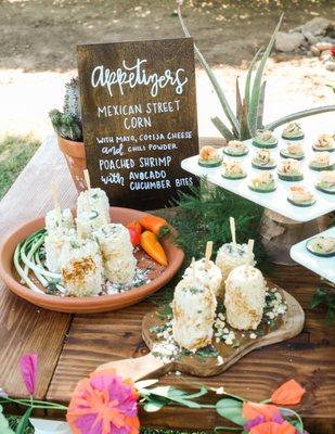 Esquites (or Mexican Street Corn) and Cilantro Lime + Avocado Cucumber bites.