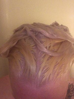 Rinsing the bleach and stupidly made the decision to use purple shampoo despite knowing it'd turn my hair purple