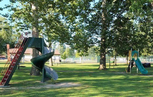 tennis courts beyond the playground