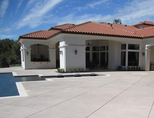 Custom pool deck with stamped concrete.