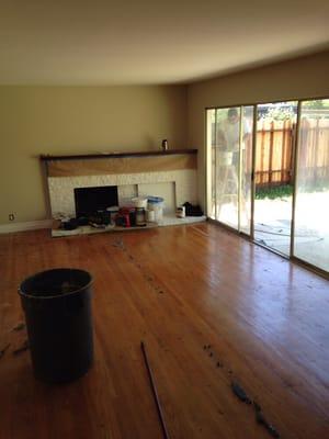 Original hardwood being uncovered, part of rehab