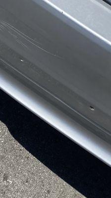 Holes from where their "work vehicles's" license plate punctured my bumper.