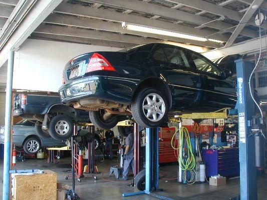 '03 Mercedes-Benz C320 on lift for service