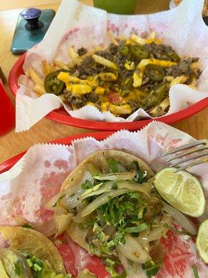 Asada fries and tacos de asada