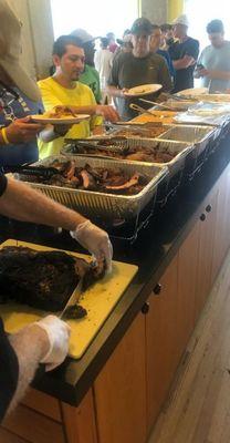 Slicing my famous brisket for 80 guests