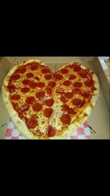 Heart shaped pepperoni pizza for Valentines day.