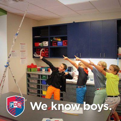 Boys love to compete and problem-solve. Today, 4th graders worked in teams to build the tallest tower from paper and tape.