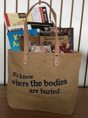 One of our themed gift bags with our tote bag. We really do know where all of the bodies are buried.