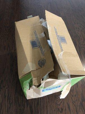 example of damaged boxes due to large items on top