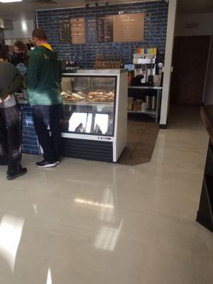 You cannot quite see the three tiers of flavored syrups behind the bakery case....it was impressive.