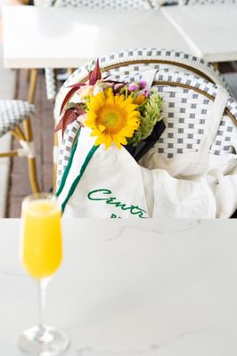 Mimosa outdoors while waiting for our Cheesin' for a Reason the Rebel Cheese Plate  by https://www.bandlcreative.com