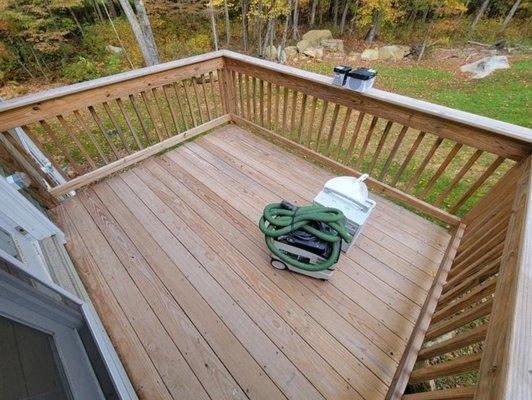 before photo of a small deck we stained