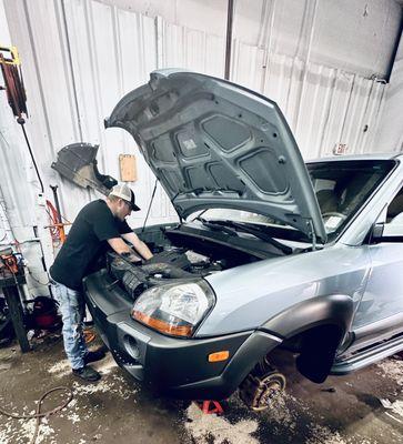 Anchor Auto employee performing multiple repairs!