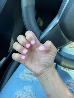 My nails after service at this salon.