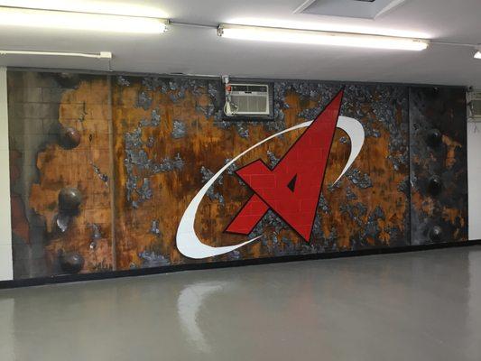 Metal reactive finish and trompe l'oeil mural for a corporate headquarters