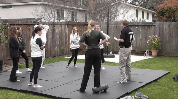 Teaching a Private Mother-Daughter class in a backyard.