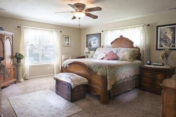 Wonderful diffused light with added directional lighting in this cozy master's bedroom.