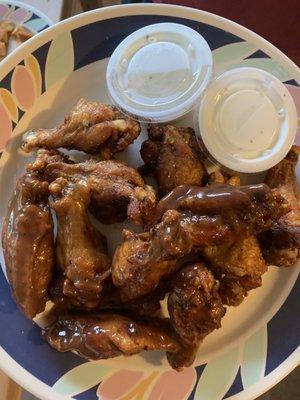 Caribbean jerk wings and lemon pepper wings.