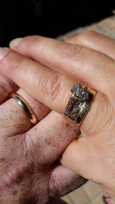 The ring that Imperial Jewelry fixed is the double diamond ring to the left.