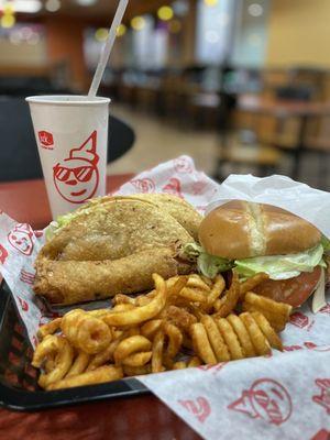 Two Tacos, Egg Roll, Jack's Spicy Chicken, and Curly Fries. Served on a tray instead of a hermetically sealed bag!