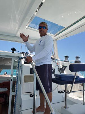 Captain Brad at the helm of the Aria!