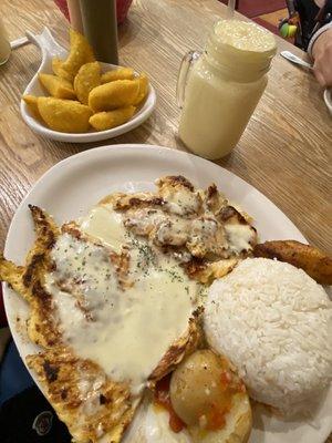 Delicious! Mini empanadas with a mango shake, & pollo a la colombiana without mushrooms