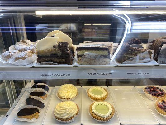 German chocolate, cheesecake, tiramisu, gelato, lime slice; cream puffs, fruit tarts.