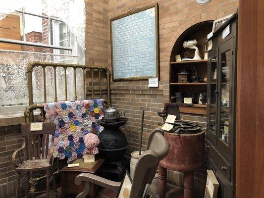 The household room in the museum displaying aspects of rural home life.