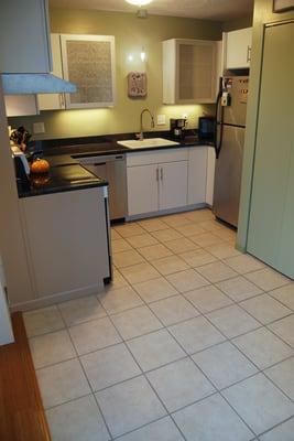 Long view of new kitchen and tile flooring