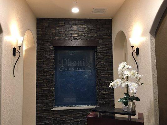 Our entry way welcomes you to an upscale salon suites concept.