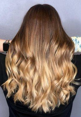 Warm balayage to lighten up and compliment natural red hair.