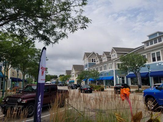 Set up like a small village. Stores and restaurants off the sidewalk, doctors and other businesses on upper level.