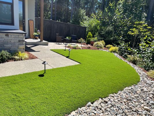 Side yard with artificial turf